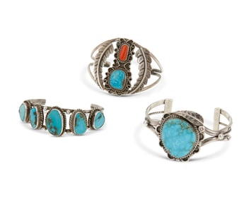 A group of Southwest-style sterling silver and stone set cuff bracelets