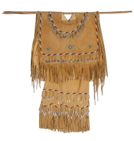 An Apache contemporary beaded hide dress