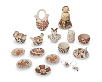 A large group of Acoma Pueblo polychrome pottery items