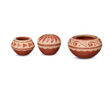 Caroline Loretto (b.1953, Jemez Pueblo), Three redware pottery seed pots, early 21st century