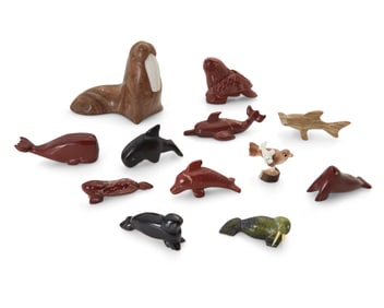 A group of Zuni & Inuit carved stone sea animal fetish figures