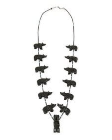 A Southwest Zuni-style carved jet bear fetish necklace