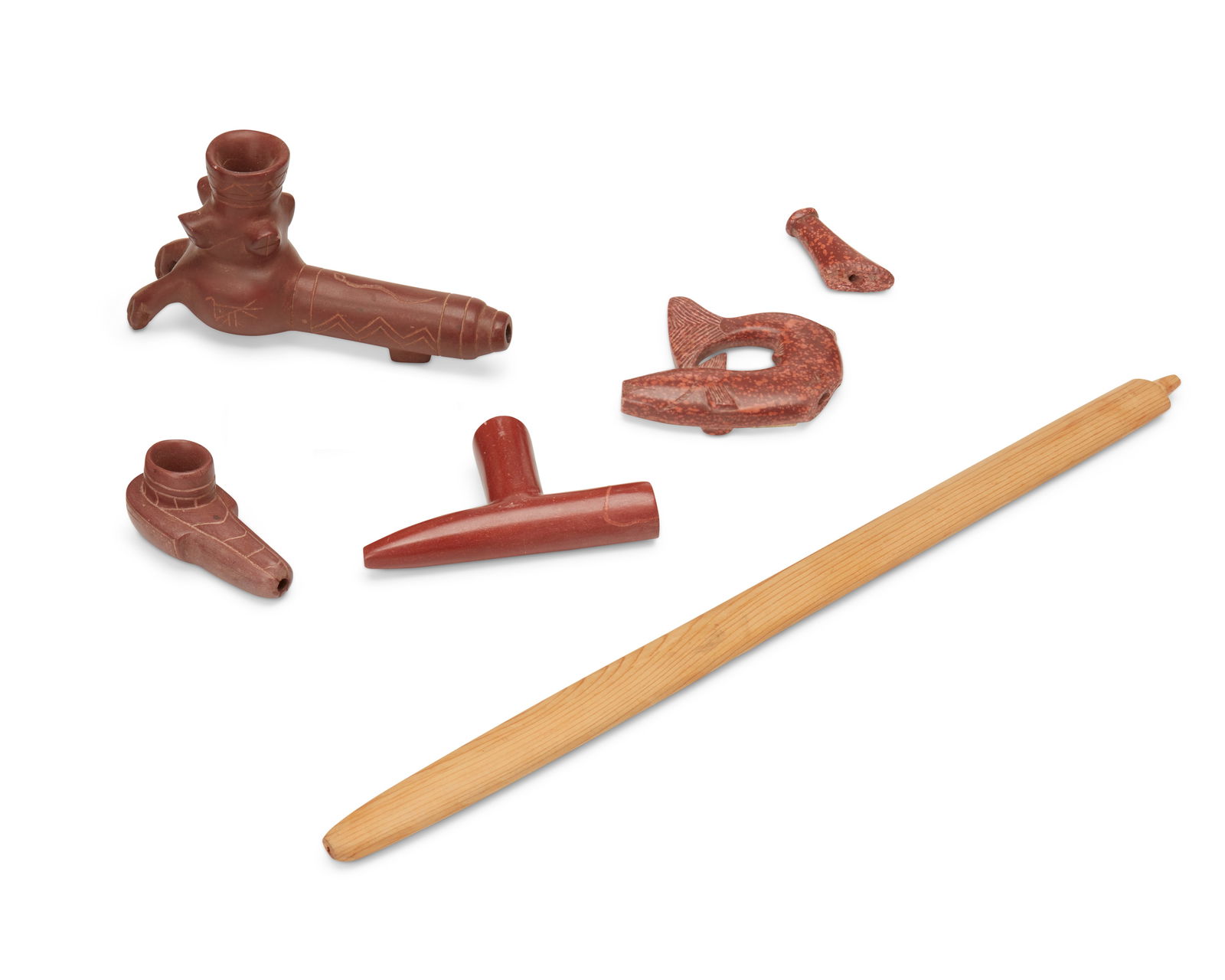 A group of Plains carved catlinite pipe ends (1 of 6)