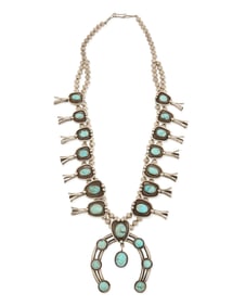 A Southwest sterling silver and turquoise squash blossom necklace