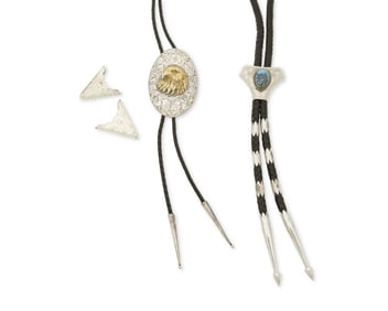A group of Western-style sterling silver bolo ties and accessories