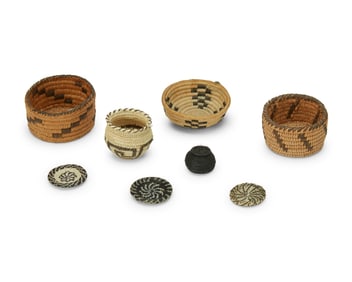 A group of miniature Native American baskets