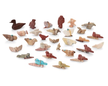 A group of Zuni carved stone and wood bird fetish figures