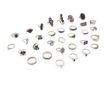 A group of Southwest silver and set stone rings