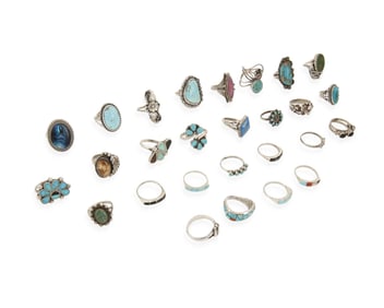 A group of Southwest silver and set stone rings