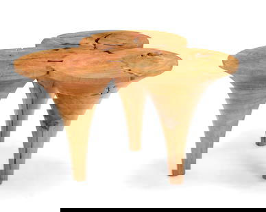 A Modern burlwood coffee table: A Modern burlwood coffee tableLate 20th/early 21st centuryThe table constructed from three tapered solid wood pieces joined by butterfly joints19.25" H x 33" W x 31.5" D