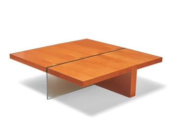 A Contemporary wood and glass coffee table