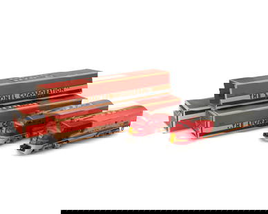 A Lionel O-gauge partial train set: A Lionel O-gauge partial train setCirca 1950sEach marked for Lionel Corporation with model numberComprising two &quot;Santa Fe Super Chief&quot; model 2333 train engines and three passenger cars in or