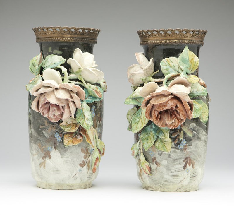 A pair of gilt-bronze-mounted faience vases: Late 19th century, French, each with raised mark impressed ''E.G.'' over ''539'' and hand inscribed in brown ''B'' and ''7084'', one also with French shipping label, each with a pierced rim over a bal