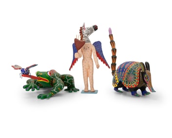 Three Mexican alebrijes figures