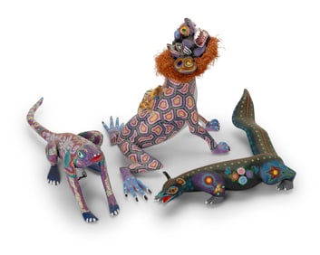 Three Mexican alebrijes fantastical figures