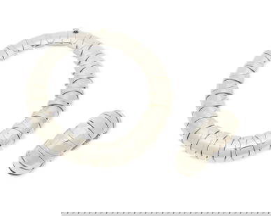 A set of Mexican sterling silver jewelry: A set of Mexican sterling silver jewelryLate 20th centuryBracelet stamped: Mexico / 925 / TA-62; necklace stamped: 925Comprising a chunky silver modernist collar necklace with alternating shaped domed