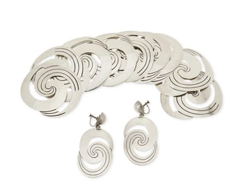 A set of Hector Aguilar silver conchos and earrings