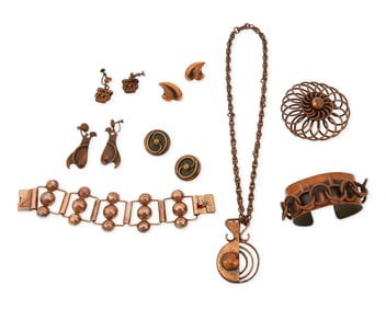 A group of mixed metal jewelry