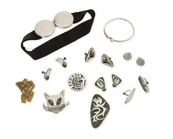 A group of silver and mixed metal jewelry