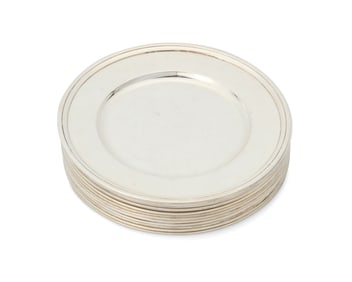 A set of twelve Tiffany & Co. sterling silver bread plates