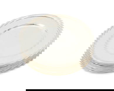 A set of twelve Tiffany & Co. sterling silver bread plates: A set of twelve Tiffany & Co. sterling silver bread platesEarly/mid-20th century; Directorship of John C. Moore (1907-1947)Each marked: Tiffany & Co. / Makers / Sterling Silver / 925-1000 / M; numbere