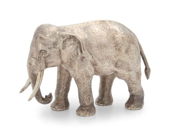 An Asprey & Co. sterling silver elephant-form desk ornament