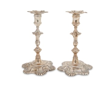 A pair of George II sterling silver candlesticks