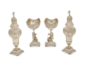 Two pairs of German .800 silver salt cellars and pepper casters