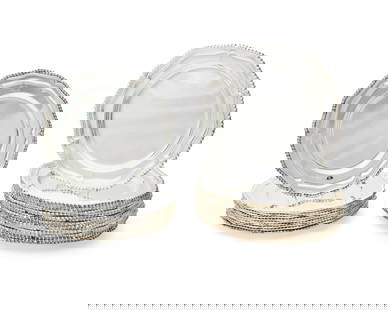 A group of Neoclassical-style silver-plated chargers: A group of Neoclassical-style silver-plated chargers20th centuryEach with indistinct marksComprising a set of 10 and a set of 37 silver-plated chargers, each with gadrooned edges, nine of the ten smal