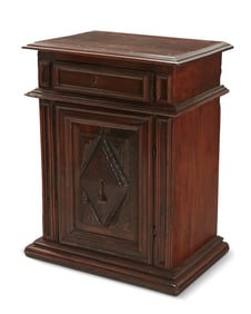 An Italian Renaissance carved walnut cabinet