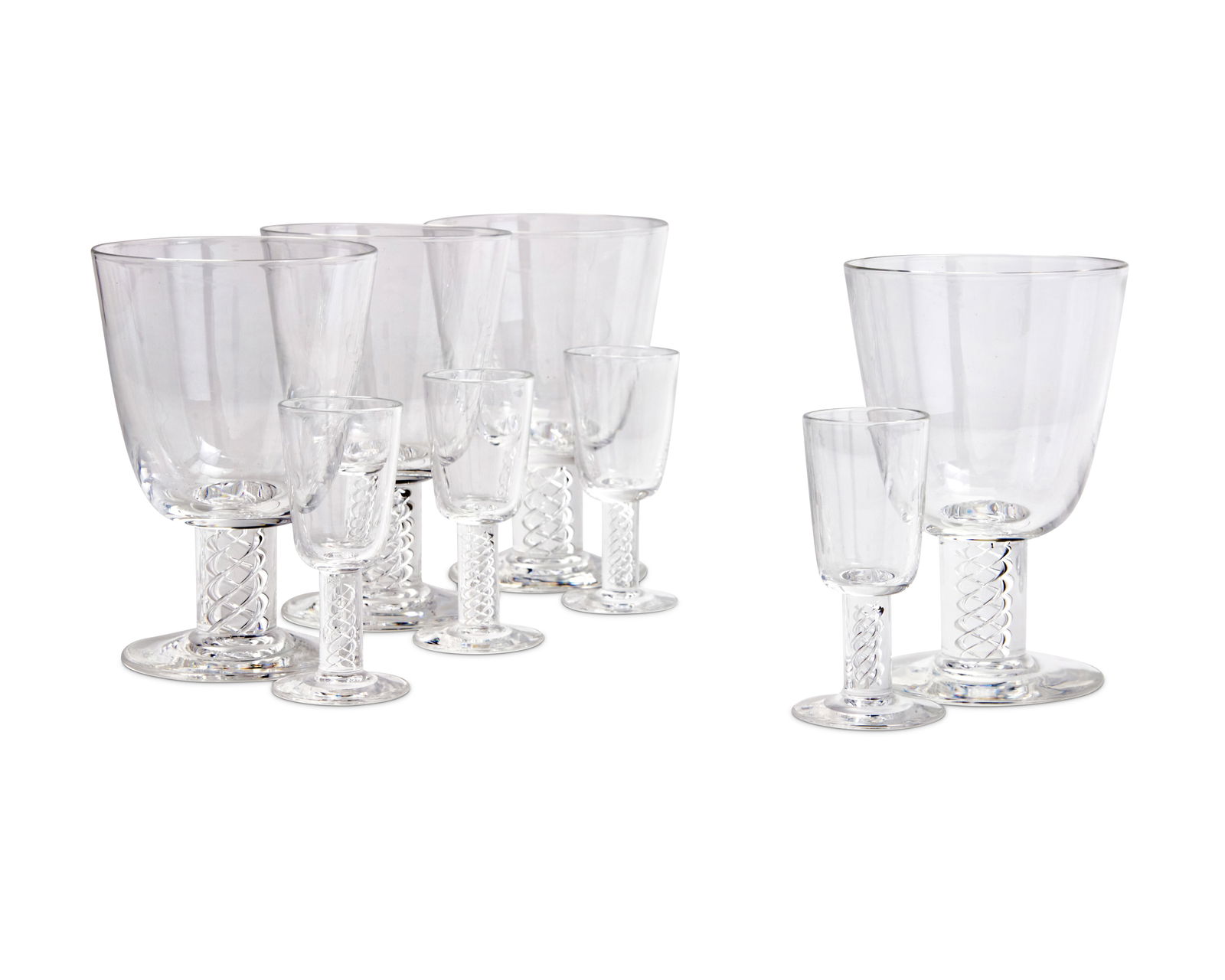 A suite of Steuben glass stemware: A suite of Steuben glass stemware20th centuryEtched: SteubenEach featuring air twist stems, comprising sixteen 5.75" water goblets and sixteen 3.875" cordials32 piecesProvenance:From the Collecti