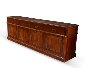 A large George III Provincial-style walnut sideboard