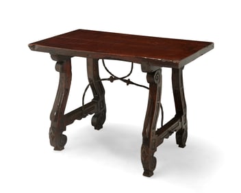 A Spanish wrought-iron and carved walnut fratino table