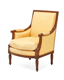 A Directoire-style carved mixed wood bergere