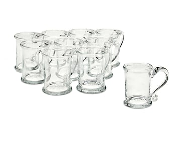 A set of ten Simon Pearce glass beer mugs