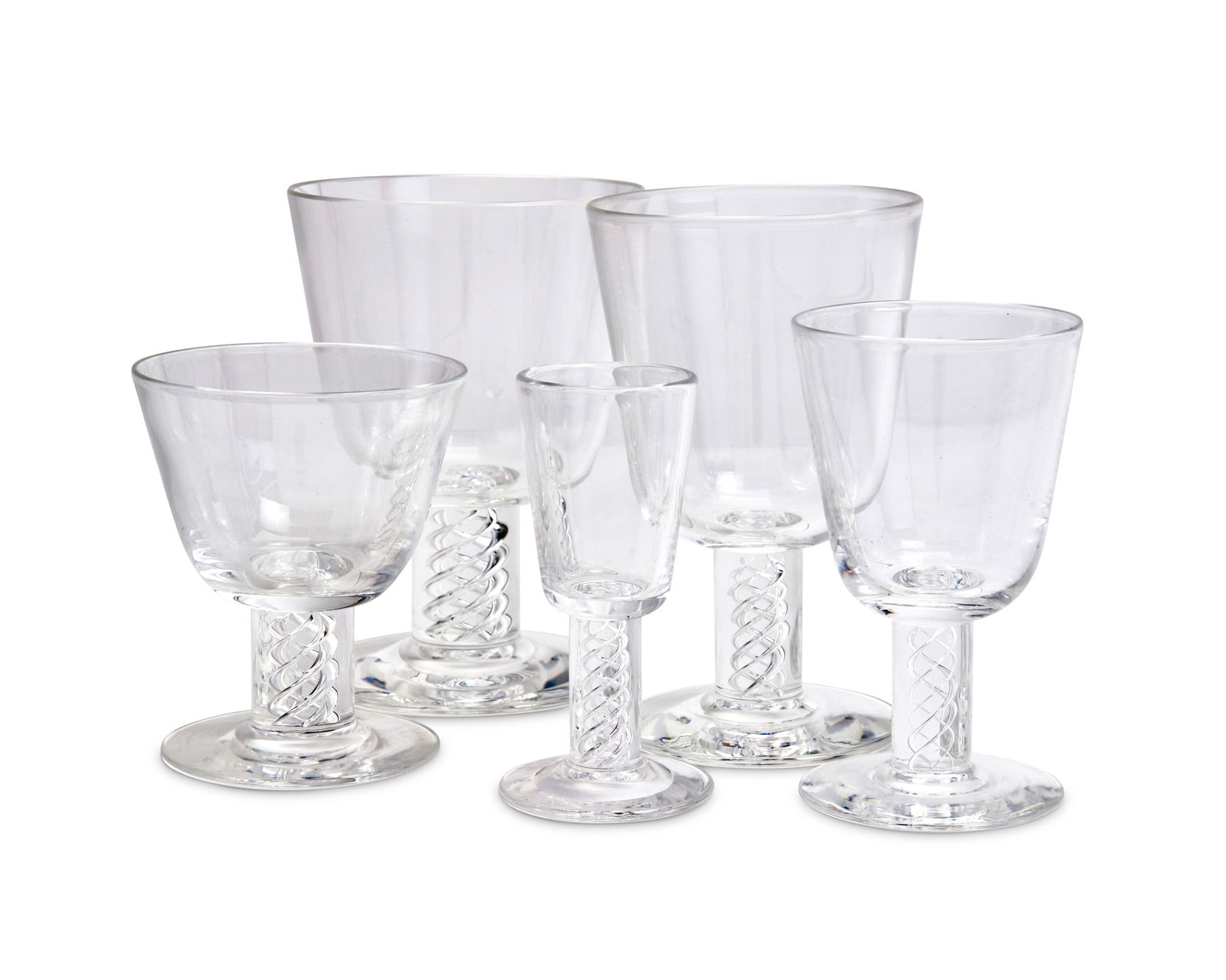 A suite of Steuben glass stemware: A suite of Steuben glass stemware20th centuryEtched: SteubenEach featuring air twist stems, comprising two 5.25" wine glasses, three 3.75" cocktail glasses, eighteen 3.875" cordial glasses, and 2 othe