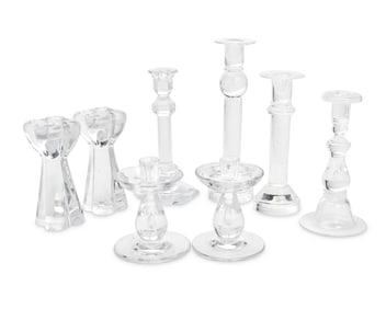 A group of Contemporary glass candlesticks