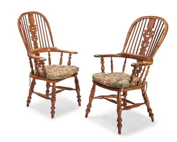 A near-pair of English yew wood Windsor armchairs