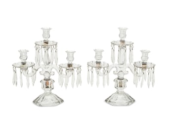 A pair of Continental molded glass three-light candelabra