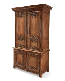 A Louis XV Provincial carved oak buffet a deux corps