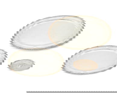 Three Sanborns sterling silver trays: Three Sanborns sterling silver traysMid-20th century; Mexico City, MexicoEach stamped to underside: [Three owls] / Sanborns Mexico / SterlingComprising a graduated pair of oval serving trays and a sau