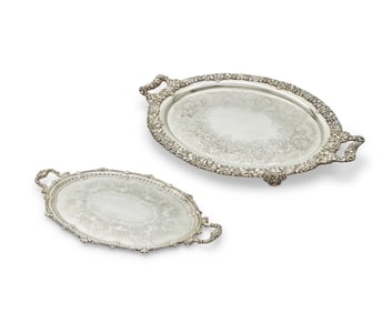 Four large silver-plated handled oval serving trays