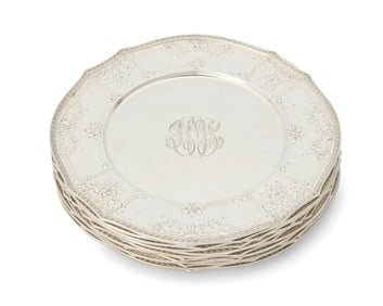 A set of twelve Gorham sterling silver service plates