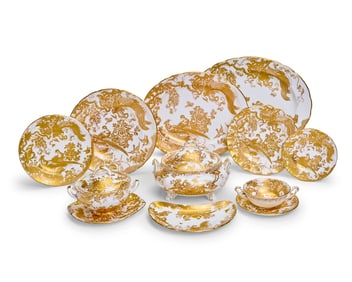 A Royal Crown Derby porcelain 'Gold Aves' part dinner service