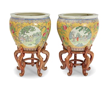 A pair of Chinese Famille Jaune porcelain fish bowls