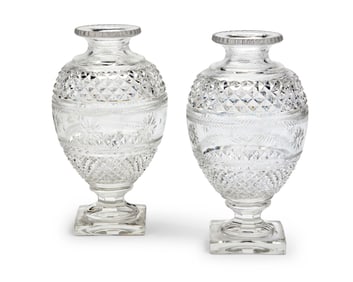 A pair of Baccarat cut glass bulbous vases