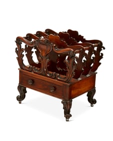 A Victorian carved mahogany canterbury
