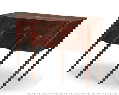 A George III mahogany sideboard: A George III mahogany sideboardLate 18th centuryFitted with two locking drawers centering opposed locking cabinet doors, each with brass pulls, raised on square tapered legs36.25" H x 48.25" W x 22" D
