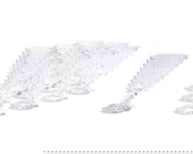 A set of twelve Steuben glass water goblets: A set of twelve Steuben glass water goblets20th centuryEtched: SteubenPattern 8011, the bowls supported by air twist stems12 piecesEach: 5.75" H Provenance:From the Collection of Robert A. Day