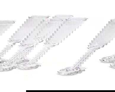 A set of twenty-four Steuben glass cordials: A set of twenty-four Steuben glass cordials20th centuryEtched: SteubenEach featuring air twist stems24 piecesEach: 3.875" H Provenance:From the Collection of Robert A. Day